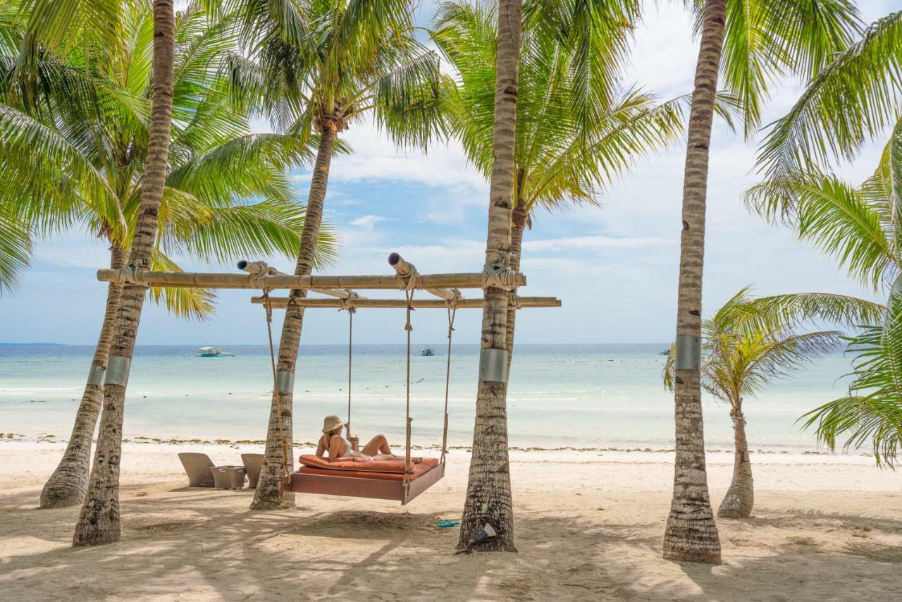 Oceanica Resort Panglao, Bohol Екстериор снимка A swing at the beach